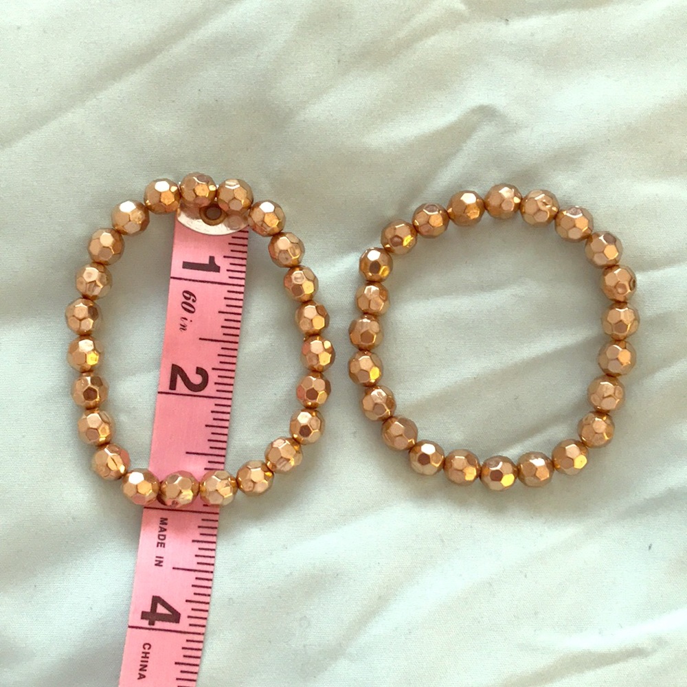 Set of two gold beaded bracelets